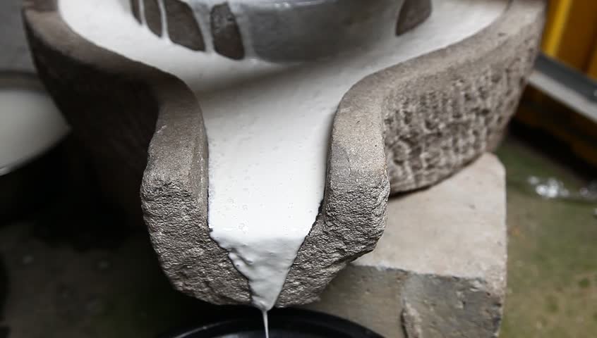 Old Fashioned Stone Mill Working With Wet Rice Making Rice Flour At ...