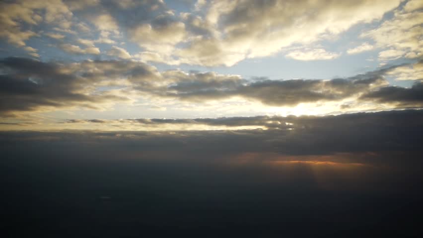 Real Rain Cloud evening. the sun hides behind clouds. the clouds obscure the sky Real Rain Cloud evening. the sun hides behind clouds. the clouds obscure the sky