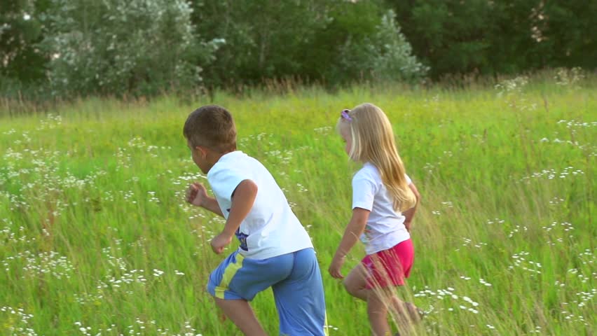 Two Happy Kids Running On Stock Footage Video (100
