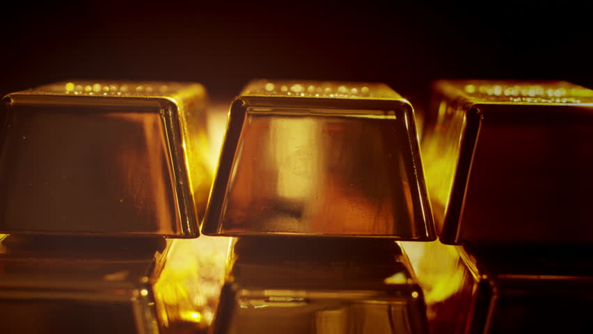 Gold bars, coins and riches. A scene of cluttered treasure and diamonds. Unimaginable wealth.