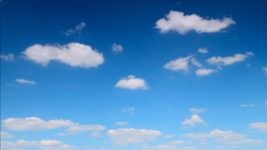 Loop Of White Clouds Over Blue Sky With God Rays - Time Lapse Stock ...