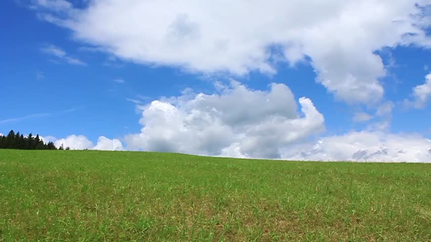 Time Lapse, White Clouds Passing Over Green Hills (windows Xp