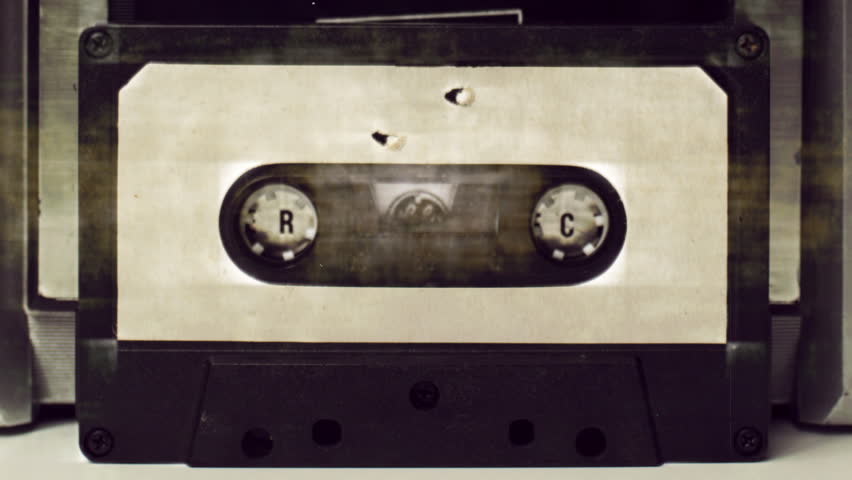 Sequence Of Old Audio Cassettes In A Retro Tape Player Stock Footage ...