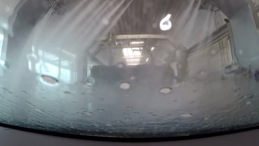 Car Wash, Tunnel Wash - View From Inside - Side Brushes Approach. A