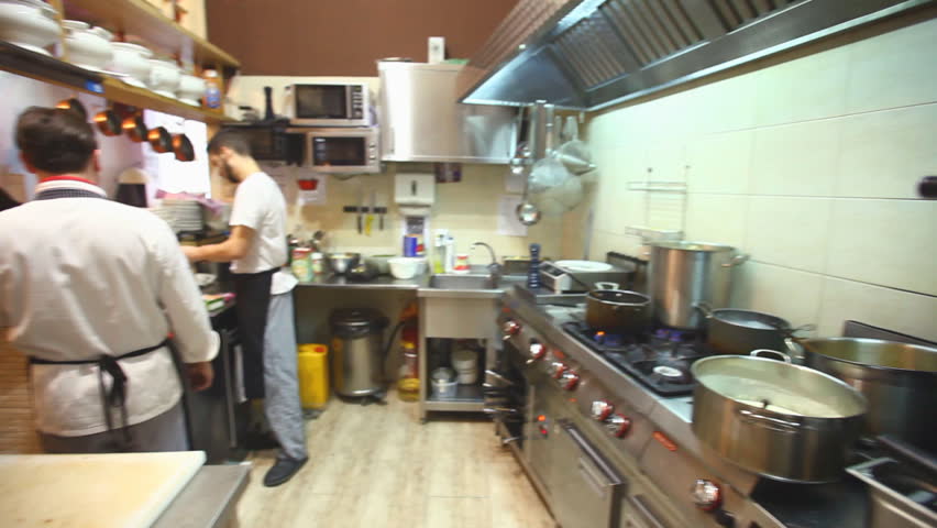 Restaurant Kitchen Video male chefs in hotel or restaurant kitchen working and washing Restaurant Kitchen Video male chefs in hotel or restaurant kitchen working and washing