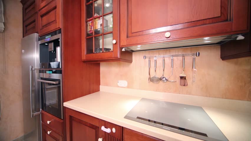 Modern Furniture Video interior of modern kitchen with beige furniture and stove stock Modern Furniture Video interior of modern kitchen with beige furniture and stove stock
