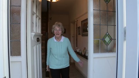 Senior Woman Opens Front Door Stock Footage Video 100 Royalty Free Shutterstock