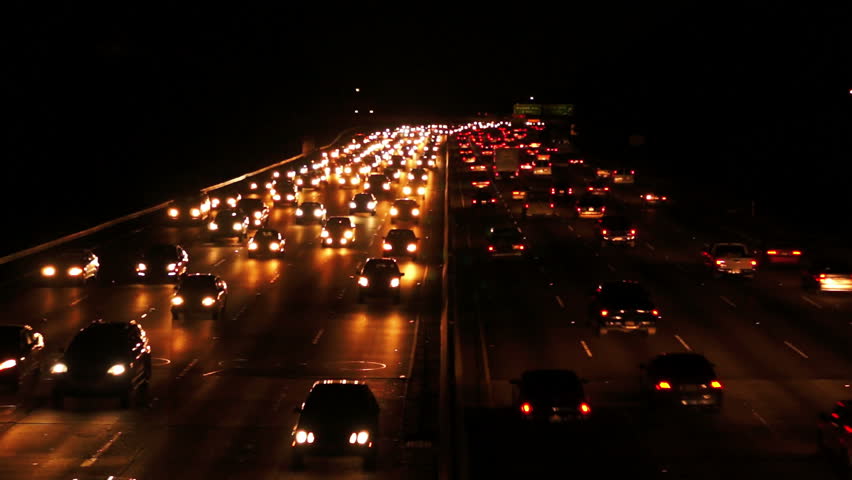 Aerial View Of Illuminated Highway Traffic At Night. Car Lights Traffic ...