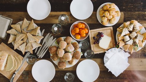 Timelapse of mixed group of people eating lunch aerial view organic food togetherness concept