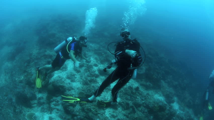 Under Water View Of Rubber Boat, Dinghy Over Coral Reef, Scuba Divers 