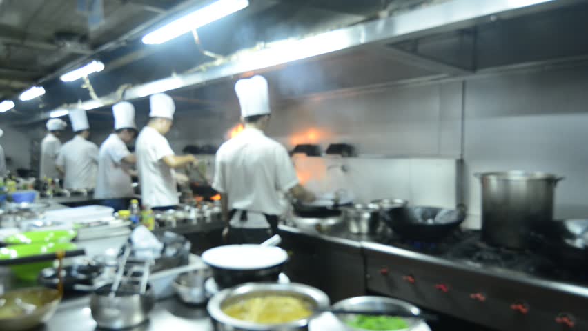 Restaurant Kitchen Pictures blur background : chefs cooking food in a restaurant kitchen stock Restaurant Kitchen Pictures blur background : chefs cooking food in a restaurant kitchen stock