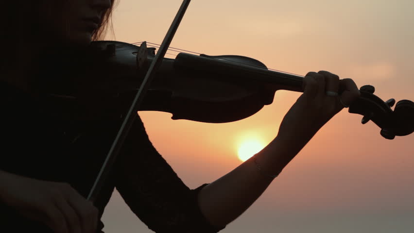 Stock video of young girl playing the violin at | 7717279 | Shutterstock