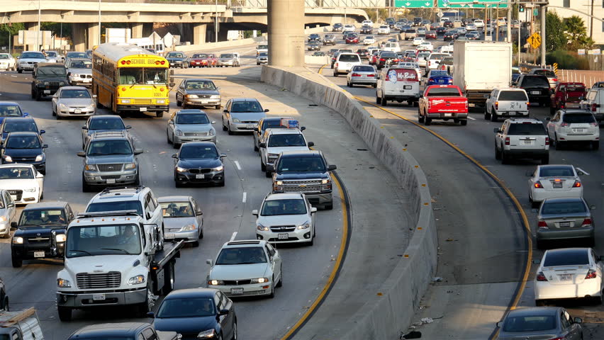 Cars Driving In Traffic Jam On 405 Freeway In Los Angeles, California 