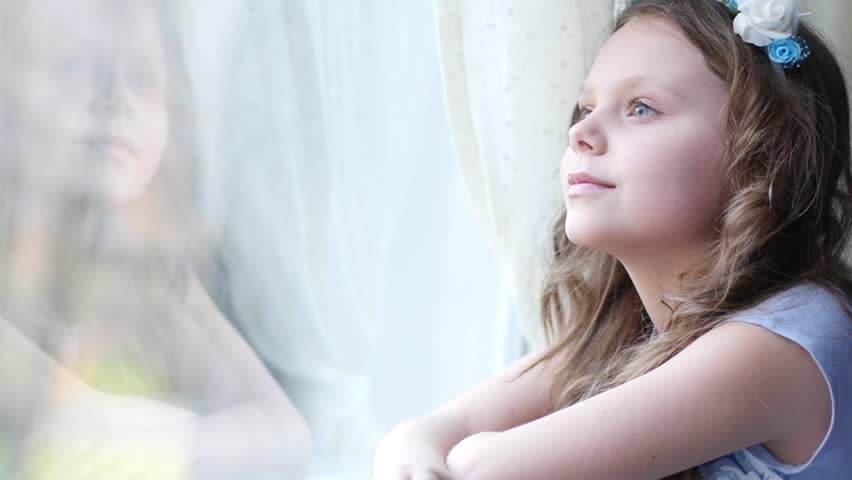 Pretty Face Little Girl Dreamily Sitting Smiling By The Window Stock ...